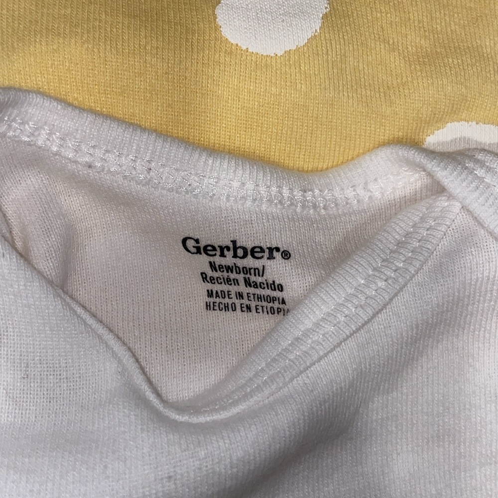 SALE NWOT three baby onesies . Two white and one yellow with large white polka - Picture 2 of 2